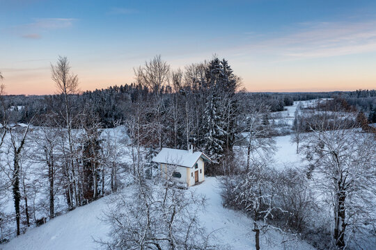 Germany, Bavaria, Bad Heilbrunn, Drone view ofKapelle Sankt Antonius von Padua in winter