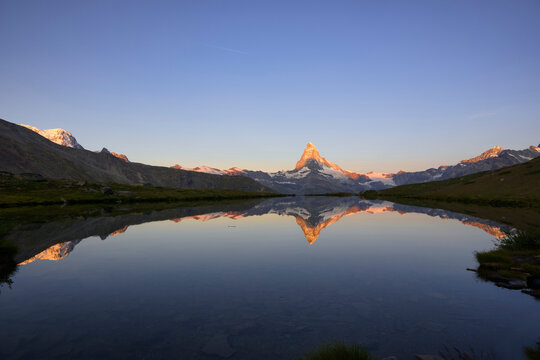 Sunrise view of Matterhorn mountain with Stellisee lake at Zermatt, Switzerland