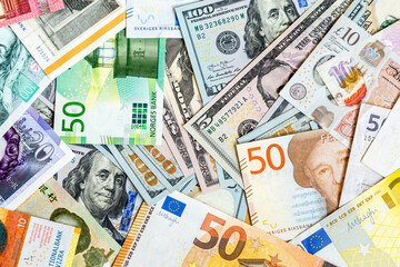 Obraz na płótnie Canvas Money background from worldwide paper currency