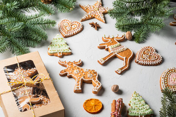 Fototapeta na wymiar Christmas homemade gingerbread cookies, festive homemade decorated sweets. Assortment of decorated Christmas cookies.