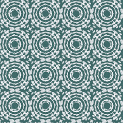 Ethnic seamless handmade pattern. Mandalas, circles, dashes, lines. Beautiful turquoise ornament on a white background. Oriental motifs. Design of background, fabric, textile, wallpaper, template.