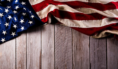 Happy presidents day concept with flag of the United States on dark wooden background.