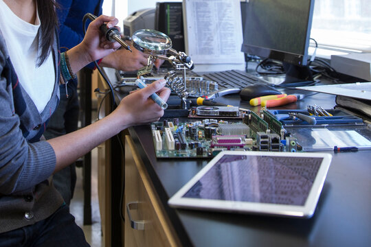 Engineer assembling electronics