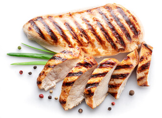 Grilled chicken fillet with herbs isolated on white background.