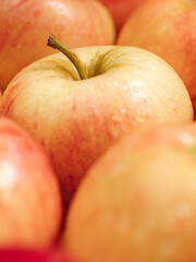 Apples fruit. Close-up vertical view of several beautiful fresh apples