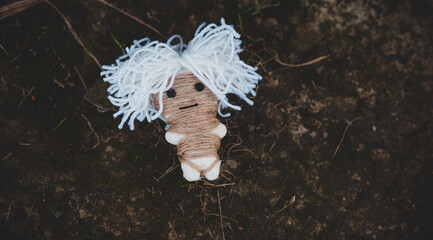 Magic handmade doll .Witchcraft with a doll. Concept of magic, voodoo