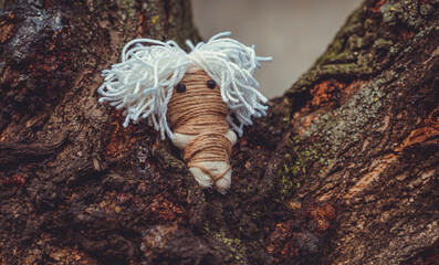 Magic handmade doll .Witchcraft with a doll. Concept of magic, voodoo