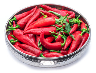 Red chilli peppers in the bowl isolated on white background.