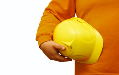 worker or engineer holding a yellow helmet in hand isolated on white background. no face.