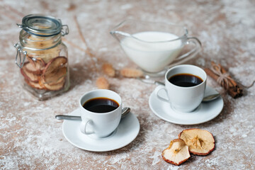 Fototapeta na wymiar Two espresso cups on the table. Morning coffee. Breakfast with coffee. Beautiful table . Breakfast.