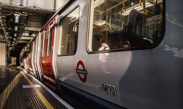 Underground sub-surface train at a Tube railway station. TFL Transport for London, rapid transit system on January 16, 2019 in London, England, United Kingdom.