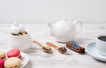 Tea, cake on a white table.