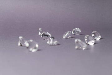 Diamonds out of Glas on a grey Background