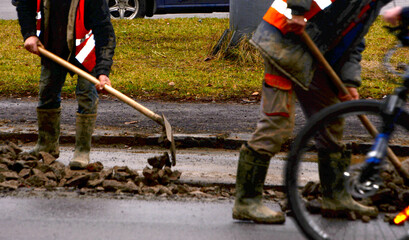 Constraction workers doing work on the stree