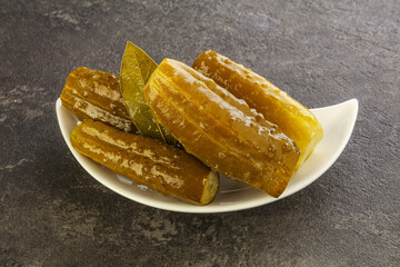 Marinated pickled cucumbers in the bowl
