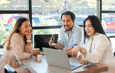 young people working casually with laptop in cafe indoor. concept for freelancer, off-site work, casual work