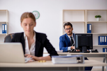 Fototapeta premium Two colleagues working in the office
