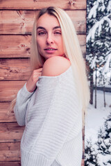 blonde woman portrait wooden background natural lights close up