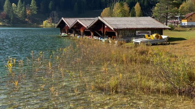 Lauter Lake with a wooden boathouse, very close to the bavarian town of Mittenwald in Germany