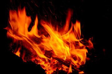 Open fire abstraction on a dark background