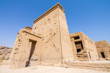 views of philae temple, full of hieroglyphics in aswan city.	