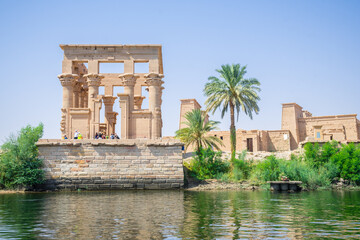 views of philae temple, full of hieroglyphics in aswan city.	