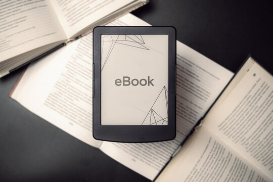 Readers. Digital e book, library reader tablet with books on dark background. Ebook, e learning electronic internet mobility concept.