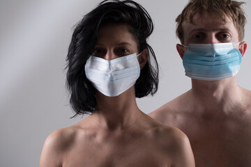 Couple in protective mask. Couple mask face. Doctor. Flu. Cold. Hope. Help. 