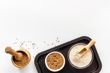 Buckwheat flour in bowl - gluten free flour for baking