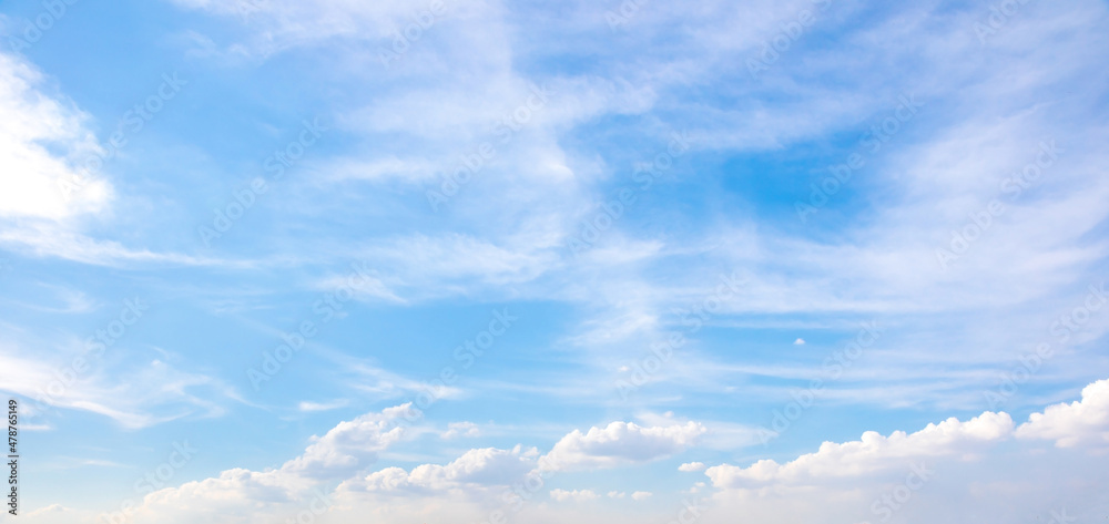 Wall mural blue sky with small white clouds for background usage.