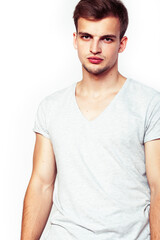 Fototapeta premium young handsome teenage hipster guy posing emotional, happy smiling against white background isolated, lifestyle people concept