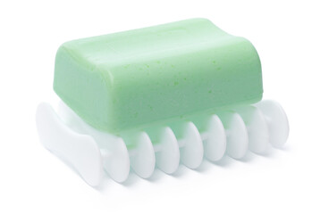 Soap on a plastic soap dish isolated on a white background
