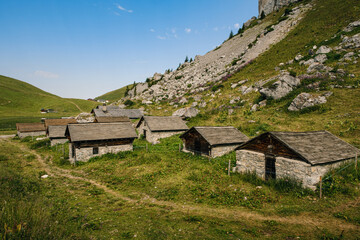 Small stone barns high up in the Vaud Alps above Leysin near the top of Tour d' Ai. Canton Vaud, Switzerland