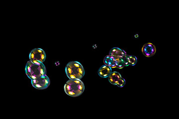 Soap bubbles isolated on a black background.