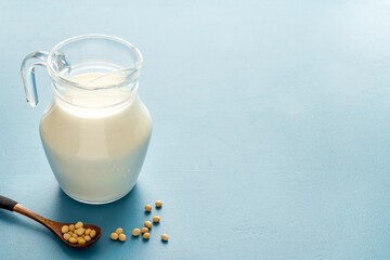Soy vegan milk with soybeans- non dairy substitute diet nutrition