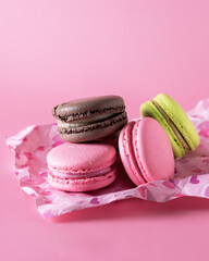 Sweet Colorful Macarons on Pink Background Tasty Colourful Macaroons French Dessert Vertical