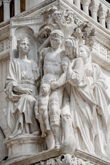 Religious and historic palace decorations at Famous San Marco square in Venice, Italy, famous Doge Palace, front side of the building.
