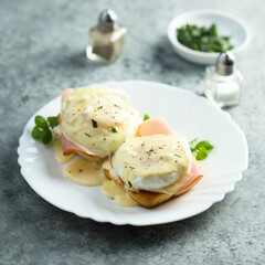 Traditional homemade Benedict eggs with ham