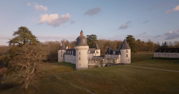 Aerial shot of the castle of the Gu&eacute; P&eacute;an by sunset in Monthou-sur-Cher, next to the Loire Valley, in France.