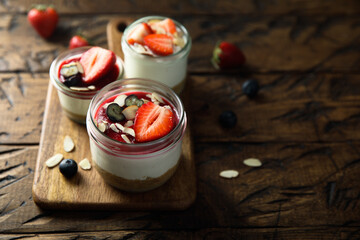 Fototapeta na wymiar Traditional homemade panna cotta dessert with berries