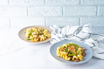 Fried Bacon roasted asparagus pasta in a plate