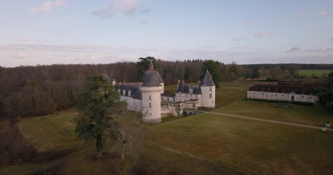 Aerial shot of the castle of the Gu&eacute; P&eacute;an by sunset in Monthou-sur-Cher, next to the Loire Valley, in France.
