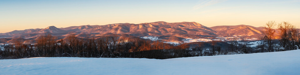A panoramic view of Shenandoah National Park bathing in beautiful golden morning winter light.