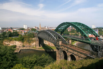 Road Bridge and train bridge crossing the river wear Sunderland. - obrazy, fototapety, plakaty