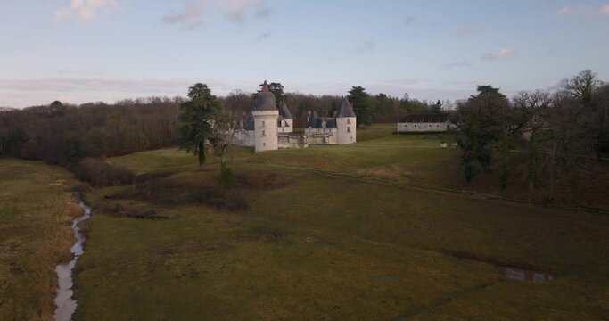 Aerial shot of the castle of the Gu&eacute; P&eacute;an by sunset in Monthou-sur-Cher, next to the Loire Valley, in France.