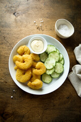 Deep fried shrimps with cucumber salad