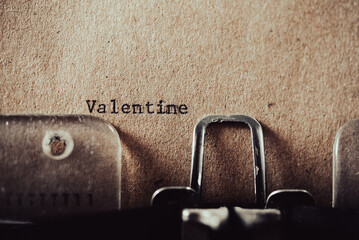 old typewriter with text Valentine on brown old paper