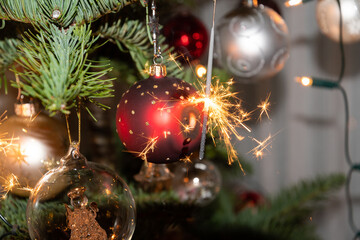 Burning sparkle lights on a christmas tree