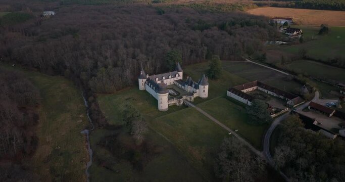 Aerial shot of the castle and stable of the Gu&eacute; P&eacute;an by sunset in Monthou-sur-Cher, next to the Loire Valley, in France.