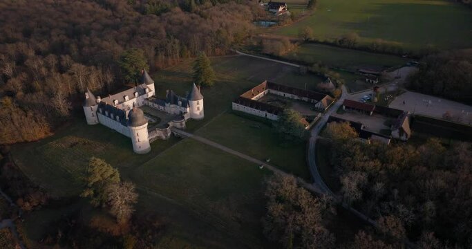 Aerial shot of the castle and stable of the Gu&eacute; P&eacute;an by sunset in Monthou-sur-Cher, next to the Loire Valley, in France.